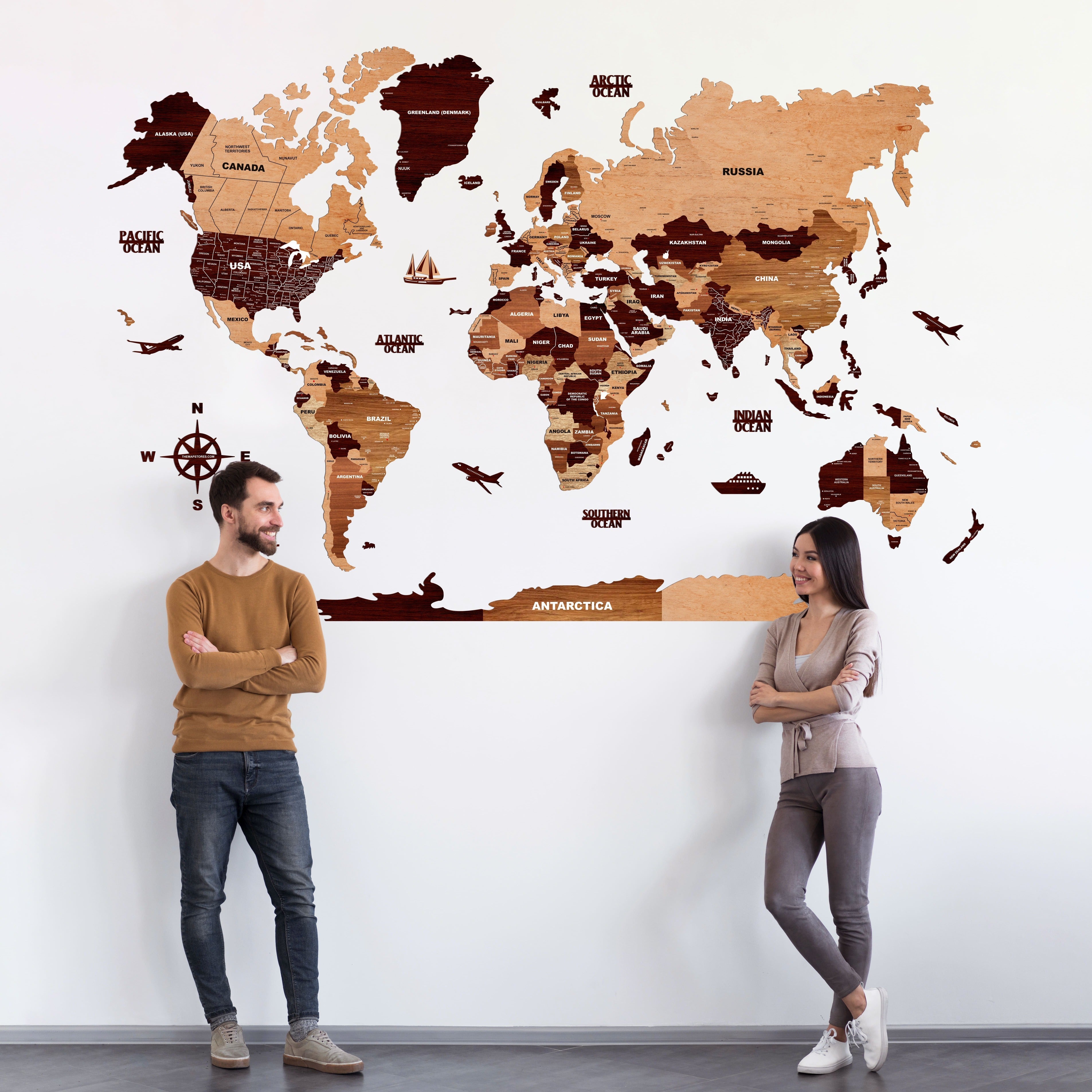 The Wall That Helps Long-Distance Couples Feel Close: Installing a Wooden World Map